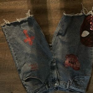 Wrangler Blue Jeans with Red and Black Accents
